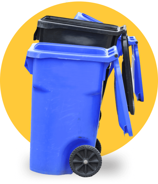 A blue trash can with black handles and wheels.